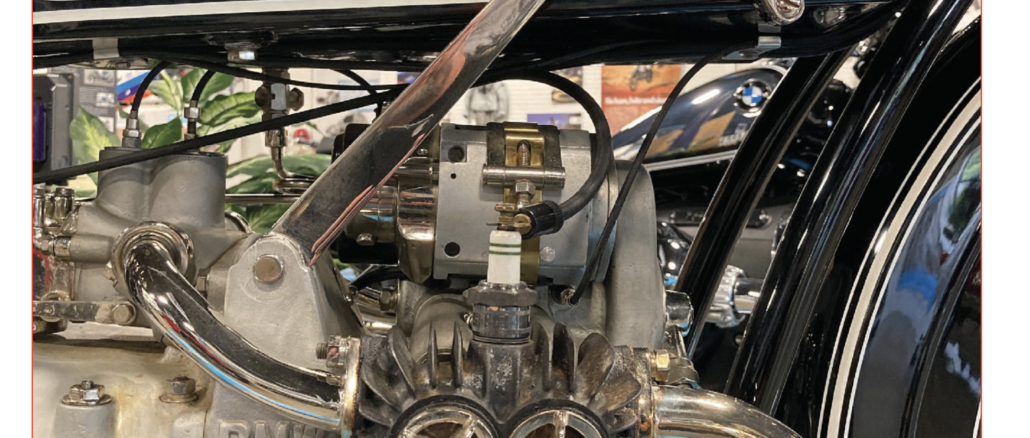Close-up of a BMW motorcycle engine showcasing intricate mechanical details.
