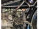 Close-up of a BMW motorcycle engine showcasing intricate mechanical details.